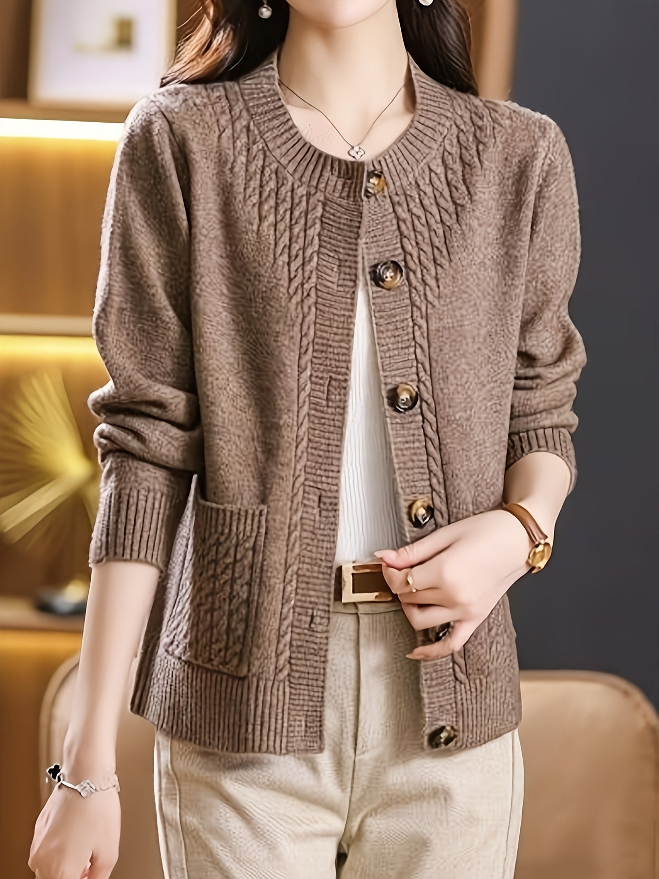 New Spring Collection for Women: a Loose-Fitting, Versatile Cardigan with a Round Neck, Solid Color, And Unique Design, Featuring Long Sleeves.
