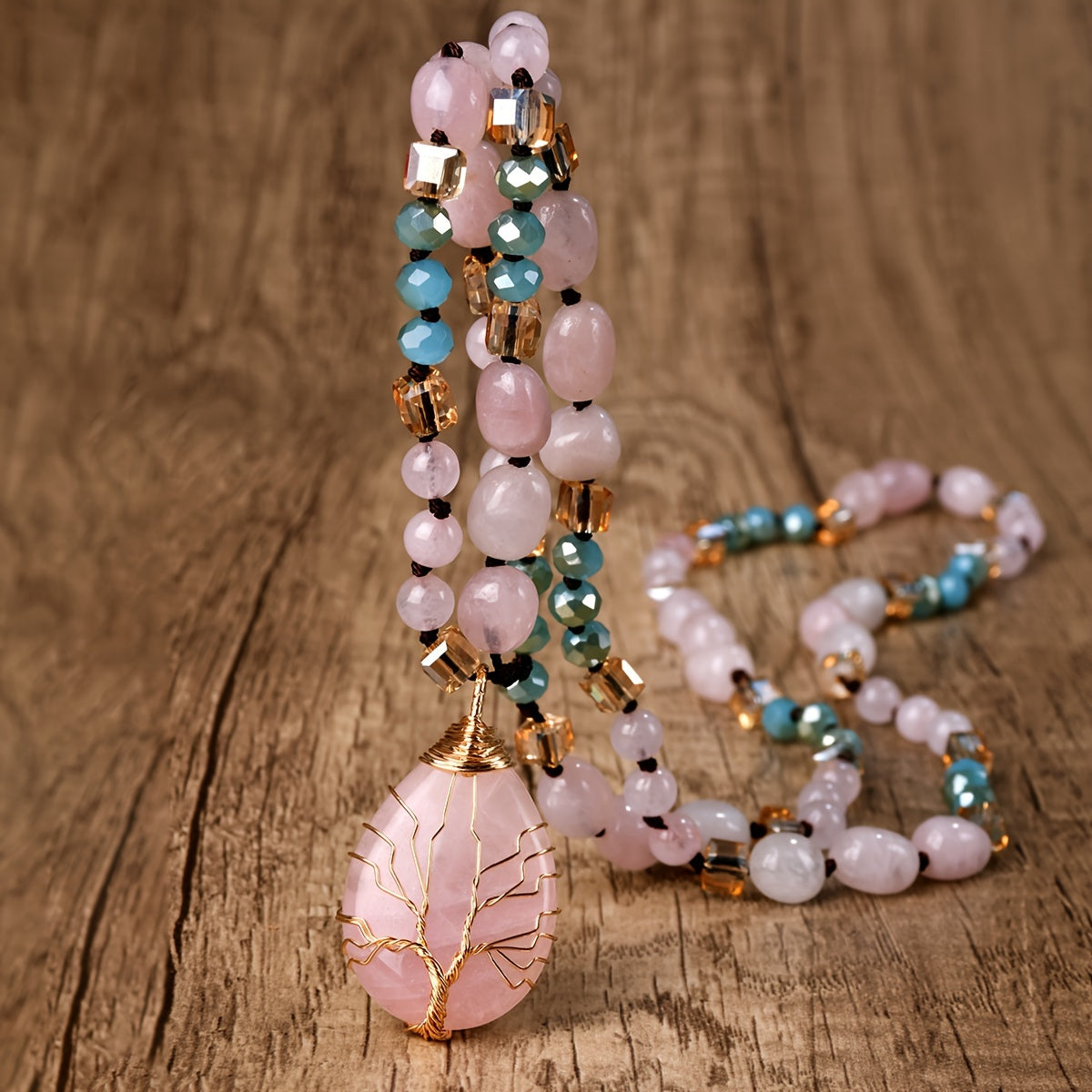 A Long Necklace Made of Natural Pink Crystal with a Teardrop Pendant, Featuring a Bohemian Vintage Style, Perfect for Everyday Wear, Vacations, And As a Gift for Friends Or Loved Ones. It'S a Crystal.